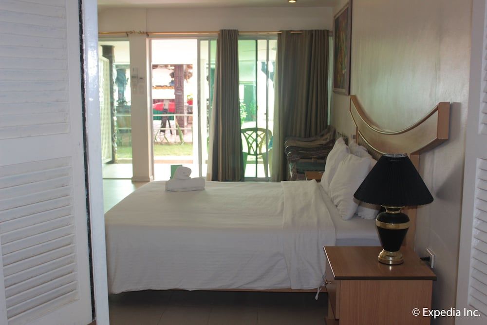 Wild Orchid Beach Resort Beach Front Room