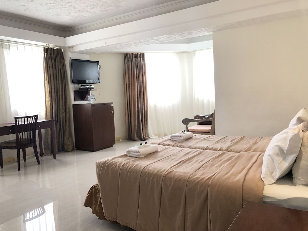 Wild Orchid Beach Resort Deluxe Twin Room