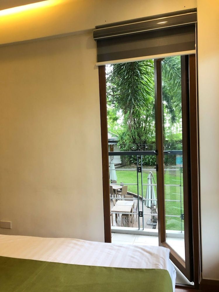 Estancia De Lorenzo Tarlac Deluxe Room, 1 Queen Bed 4
