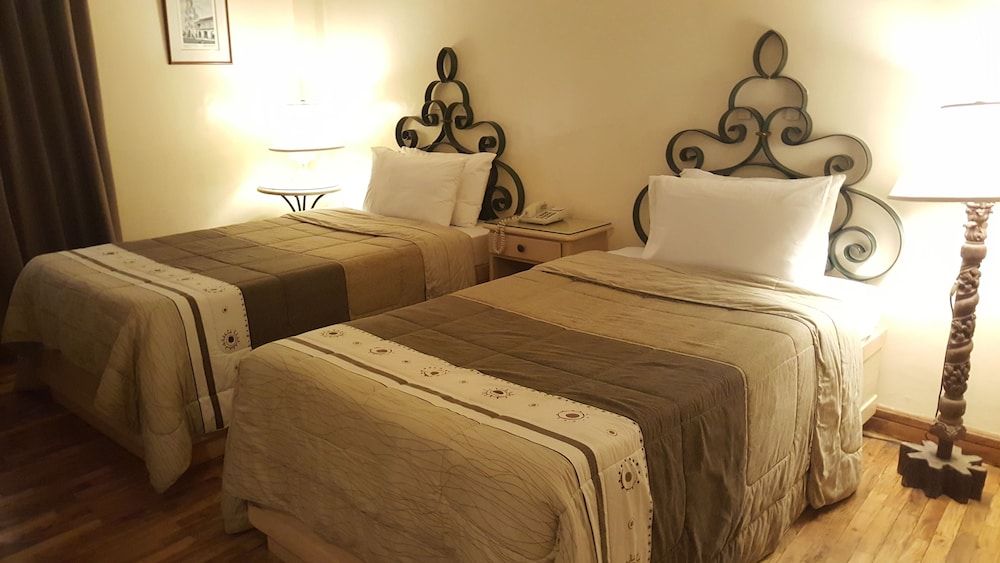 Roxas President's Inn Deluxe Twin Bed 2