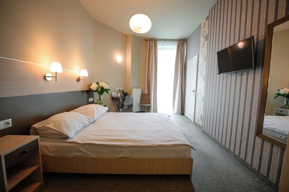 Double Room with Extra Bed and Private Bathroom