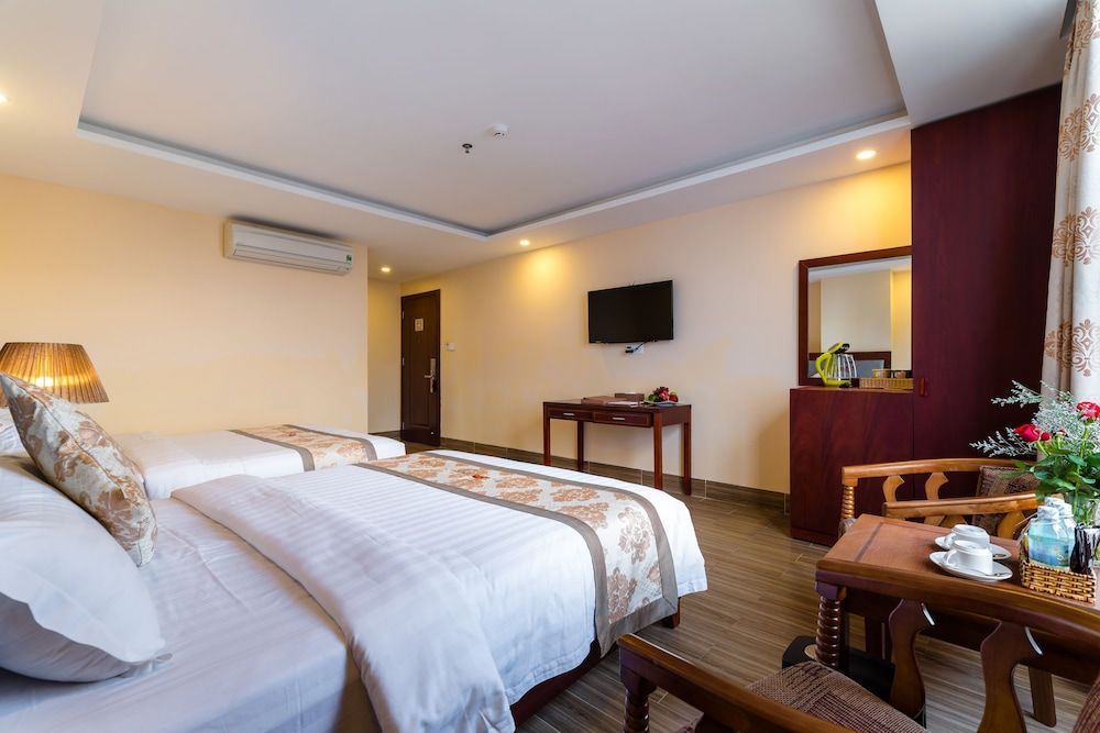 Deluxe Quadruple Room, 2 Queen Beds, Partial Ocean View