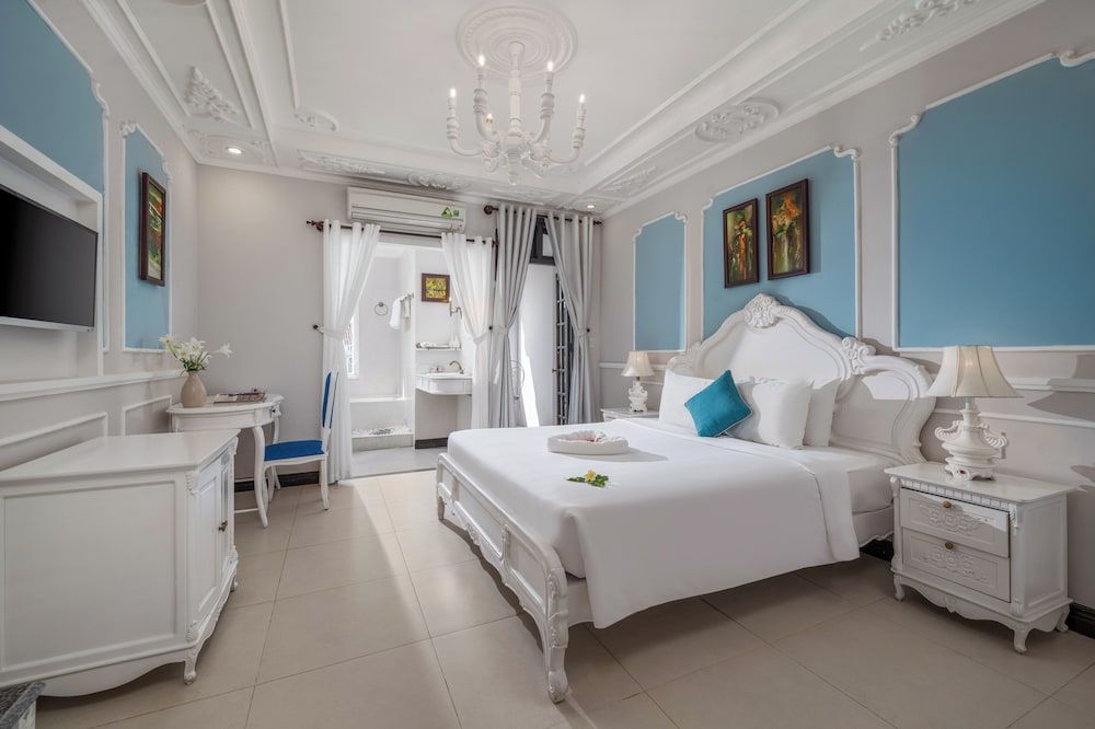 Hoi An Garden Palace & Spa Family Quadruple Room, Multiple Beds, Bathtub, Garden View 3