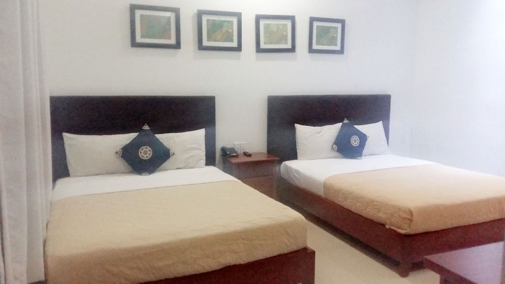 OYO 1144 Giang Son 3 Hotel Deluxe Triple Room 2