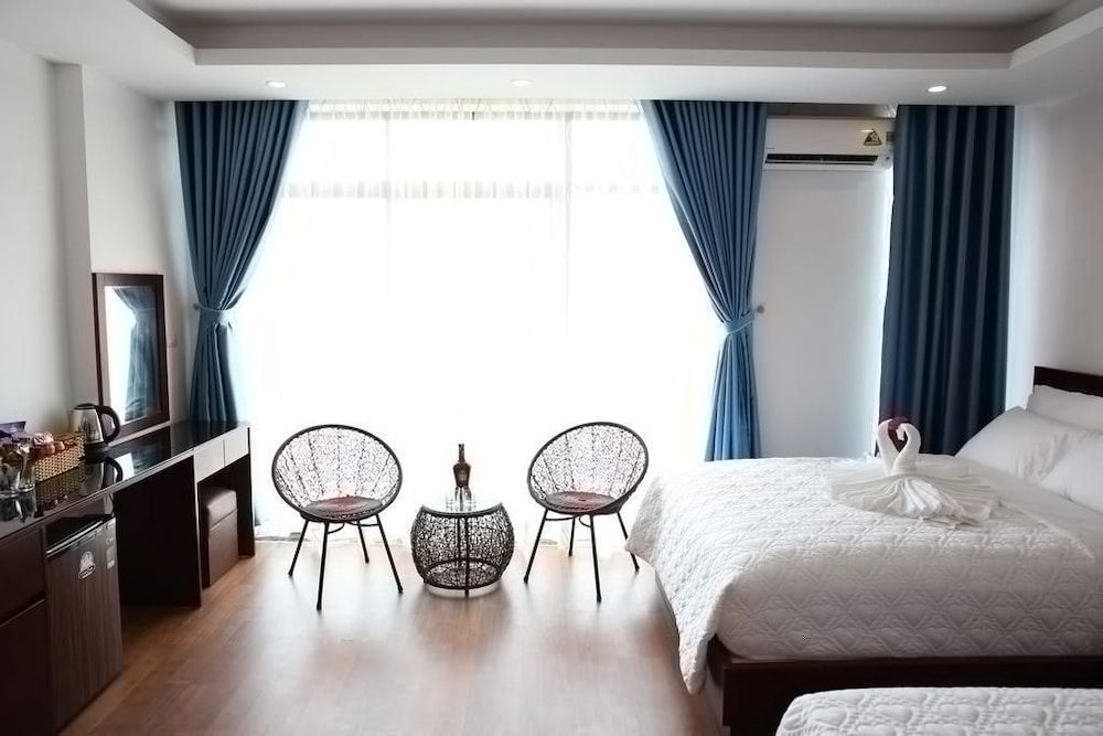 Camellia Hotel Deluxe Quadruple Room 2