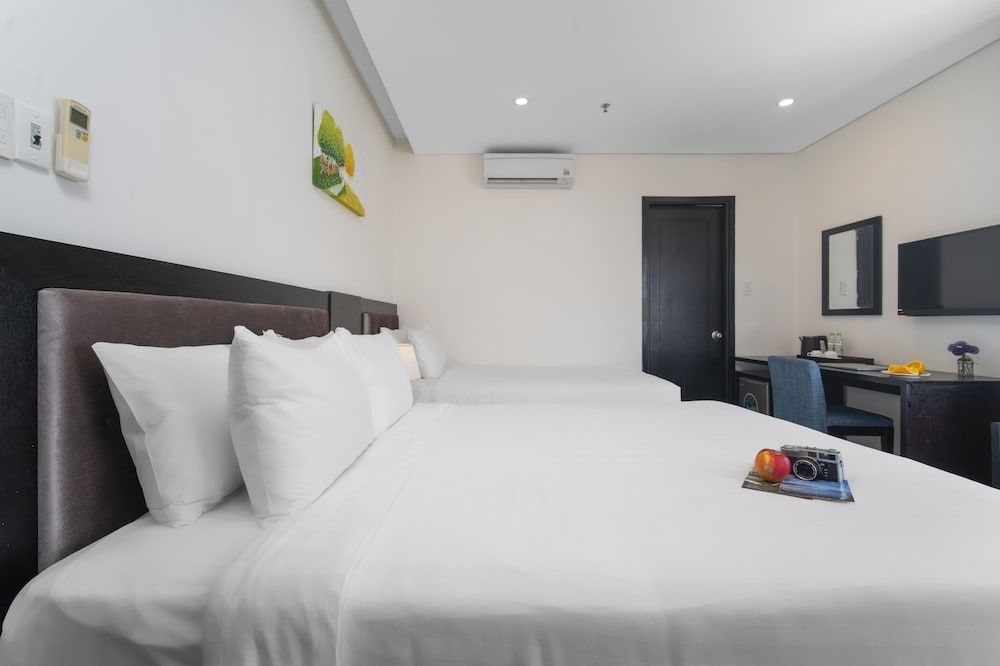Deluxe Triple Room