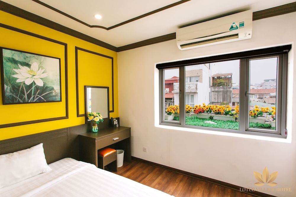 Lotus Village Hotel Deluxe Triple Room 4