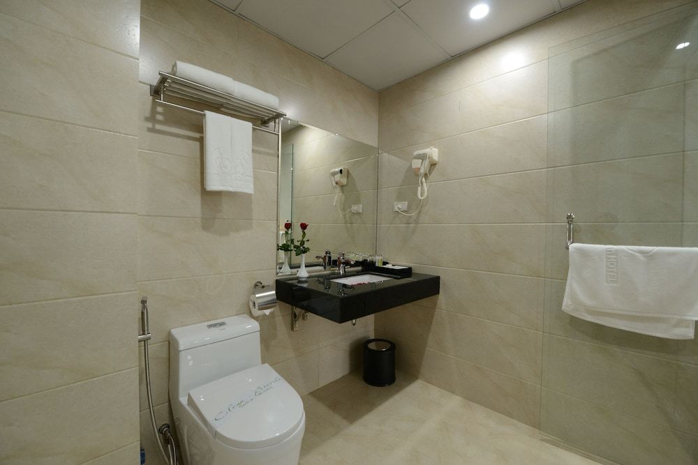 Blue Hanoi Inn City Hotel Family Room with City View 5