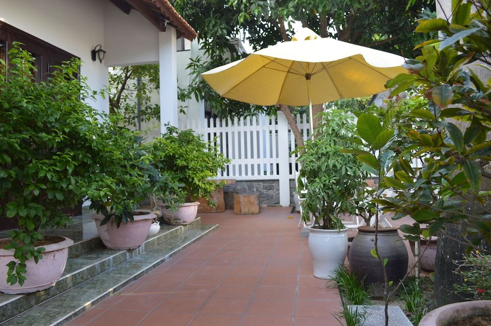 Halo Homestay Deluxe Double Room, Garden Area 12