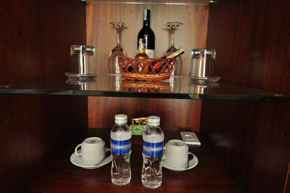 Central Hotel and Residences Deluxe Double Room 9