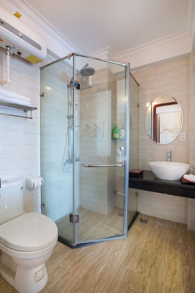 Ruby Hotel Deluxe Triple Room 4
