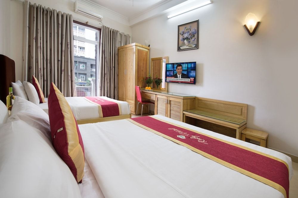 Ruby Hotel Deluxe Triple Room 3