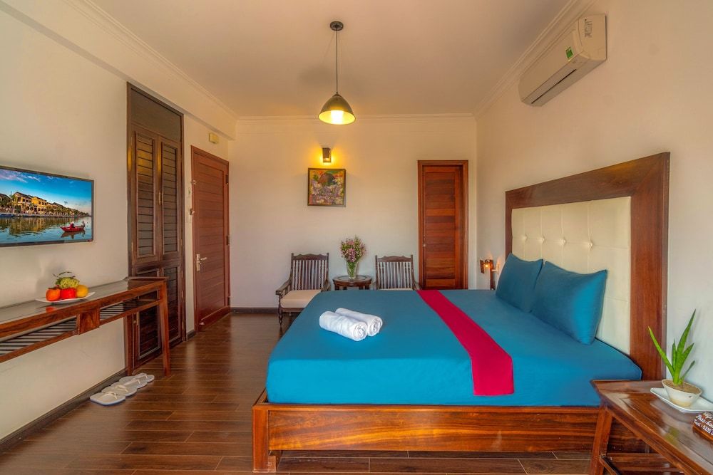 Calm House Hotel Hoi An Deluxe Double Room, Balcony, City View 2