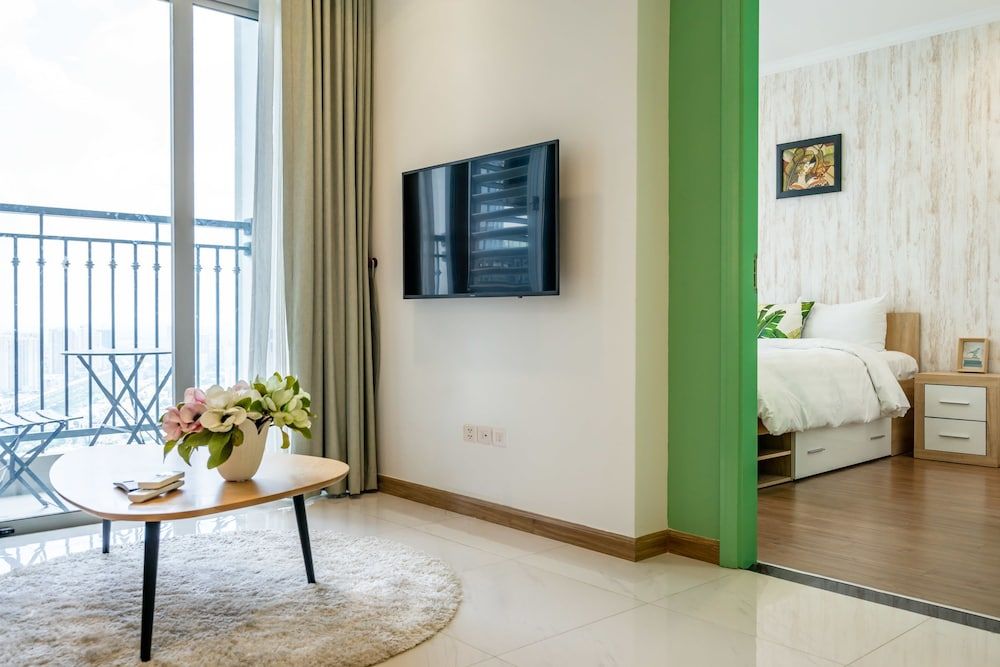 Hoasun Boutique Apartment - Vinhomes Central Park One-Bedroom Apartment with Balcony and City View 25