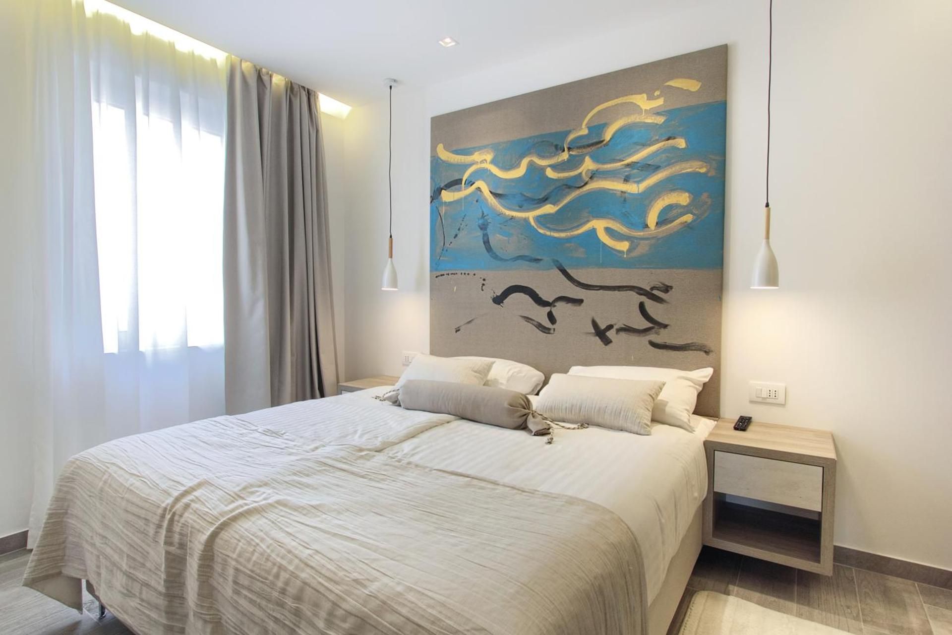 Two-Bedroom Suite with Balcony and Sea View