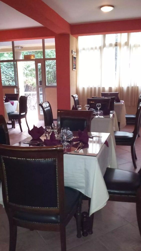 undefined The Lions Den Hotel 9
