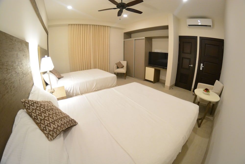 Standard Quadruple Room, 2 Double Beds, Garden View, Ground Floor