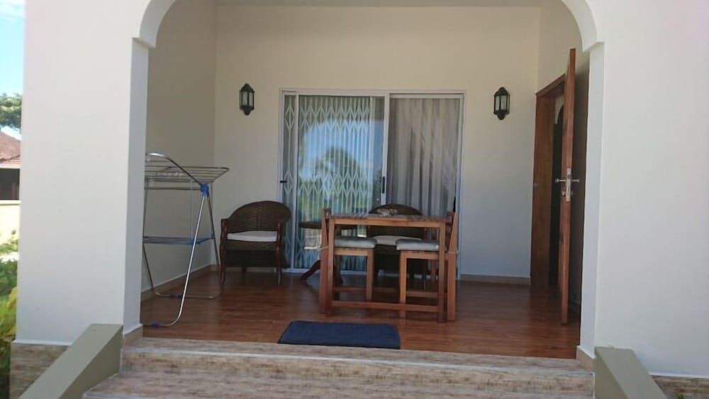 Seashell Beach Villa Room, Garden View 7