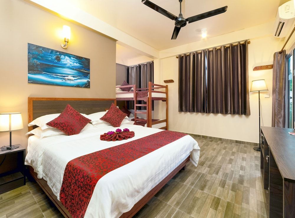 Paguro Beach Inn Family Room with Island View 2