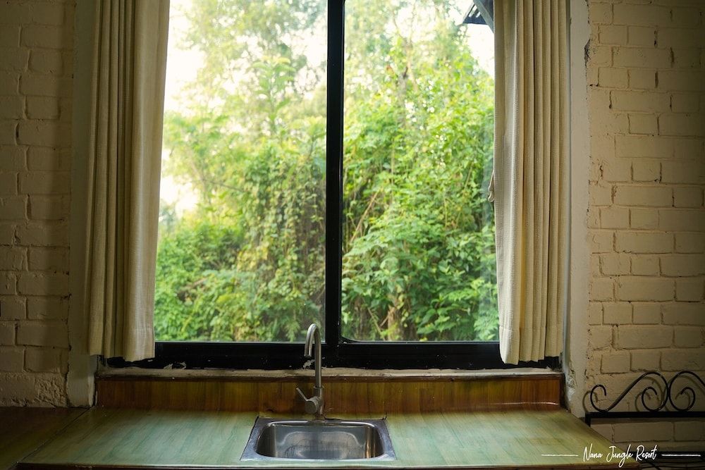 Nana Jungle Resort Near Chitwan National Park Deluxe Room 2