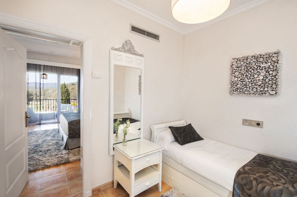 Sallés Hotel Mas Tapiolas Triple Room, Garden Area (Spa access) 3