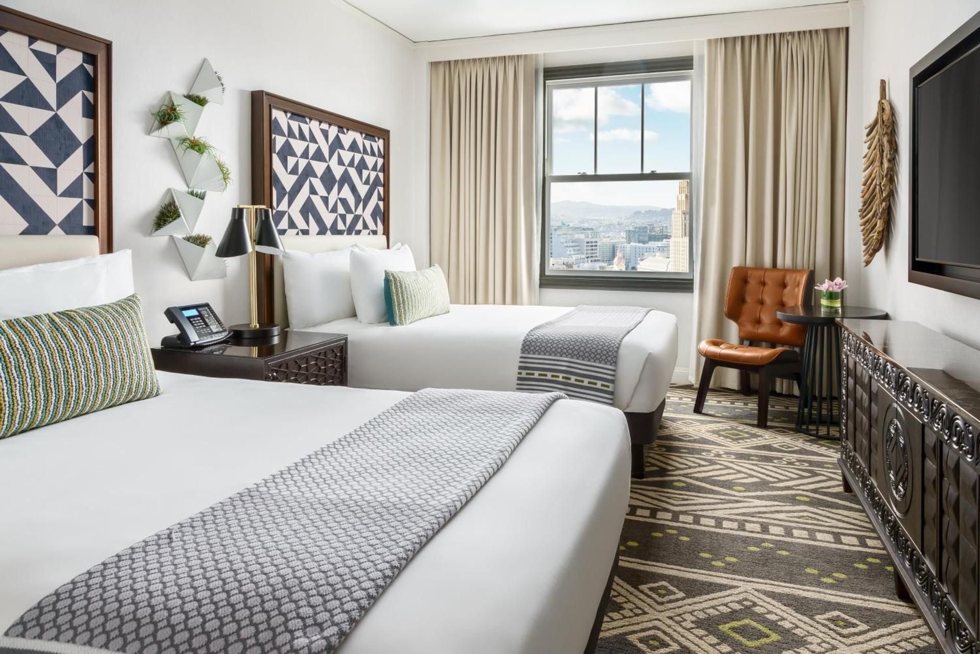 Family Suite with Two Queen Beds and Mobility Accessible Roll-in Shower