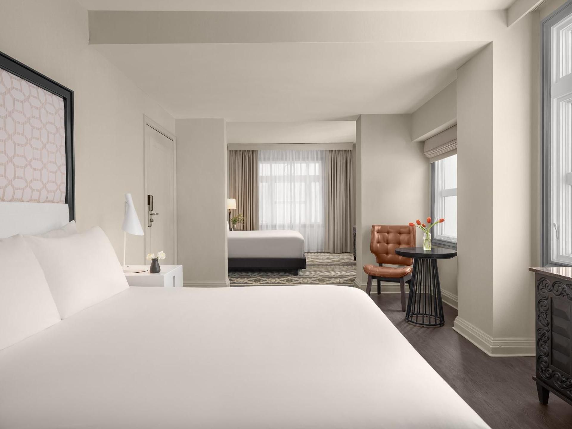 Family Suite with Two Queen Beds and Mobility Accessible Roll-in Shower