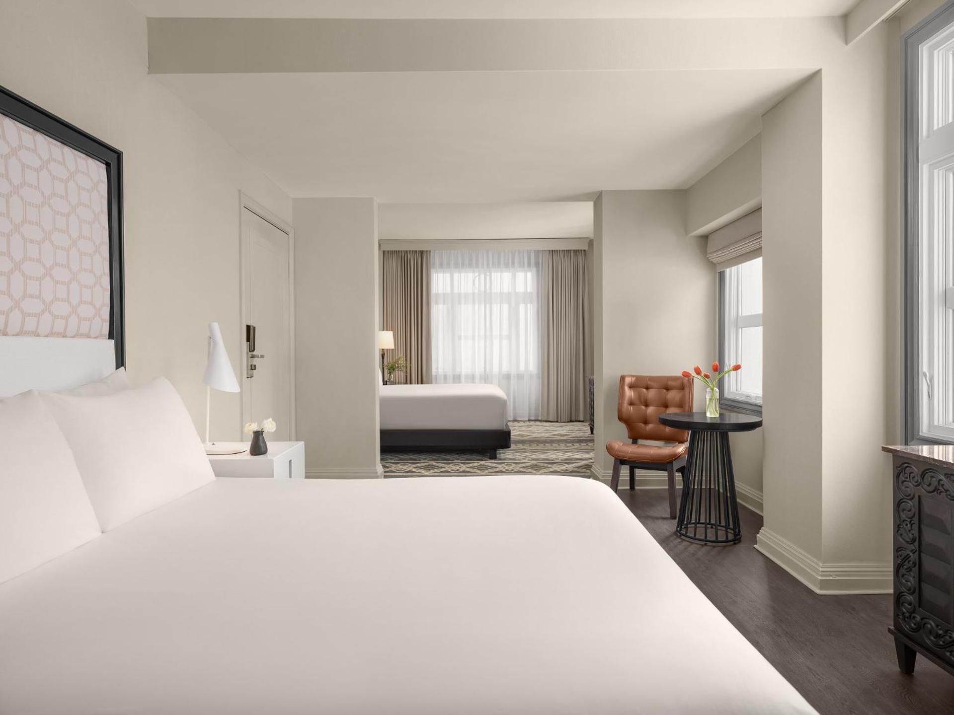 Family Suite with Two Queen Beds and Mobility Accessible Roll-in Shower