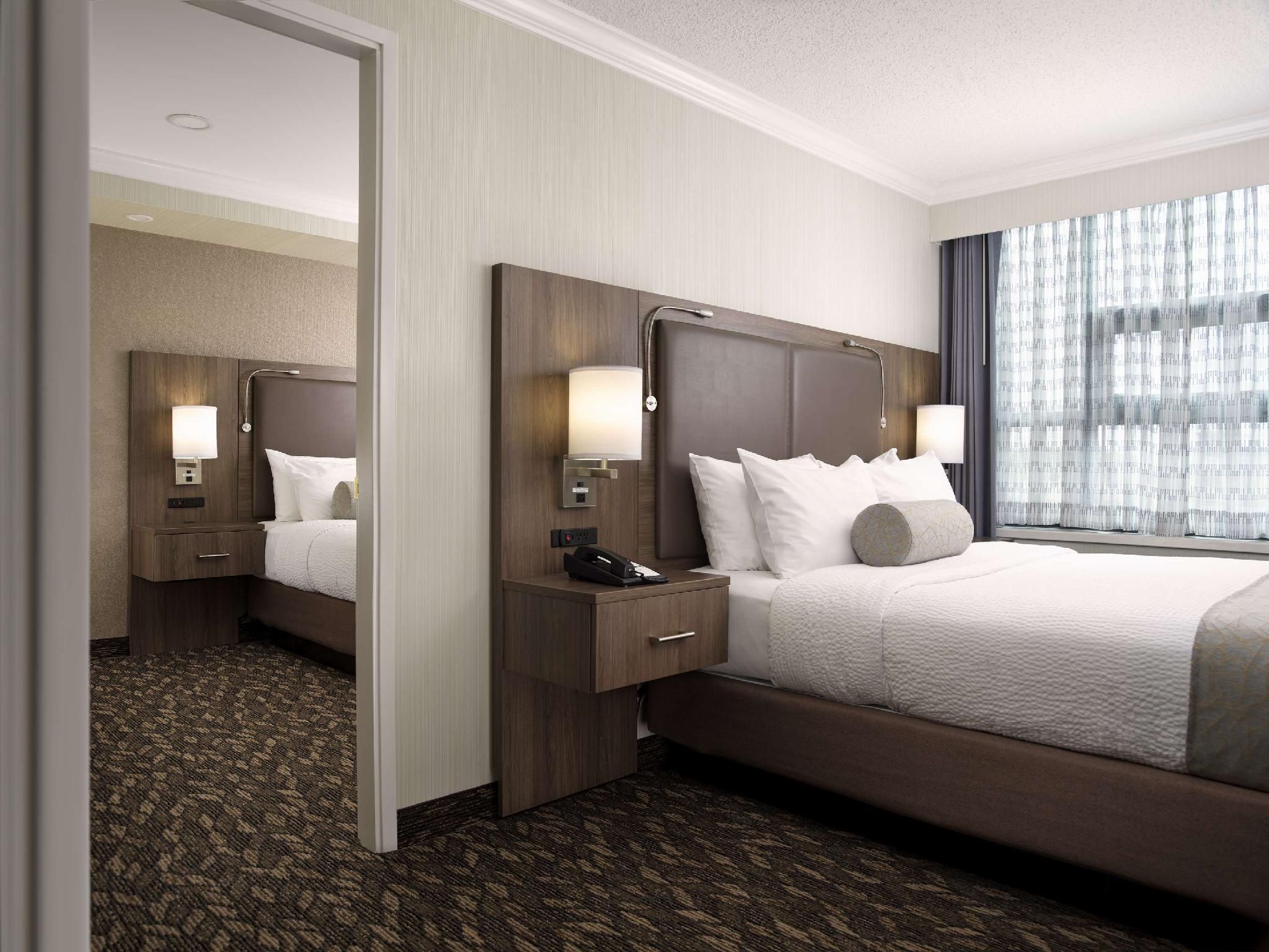 Suite - 1 King 1 Queen, Nonsmoking, Sofabed, Full Kitchen