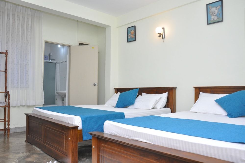 Hanthana Holiday Rooms Family Quadruple Room, 2 Double Beds, Non Smoking, Garden Area 3