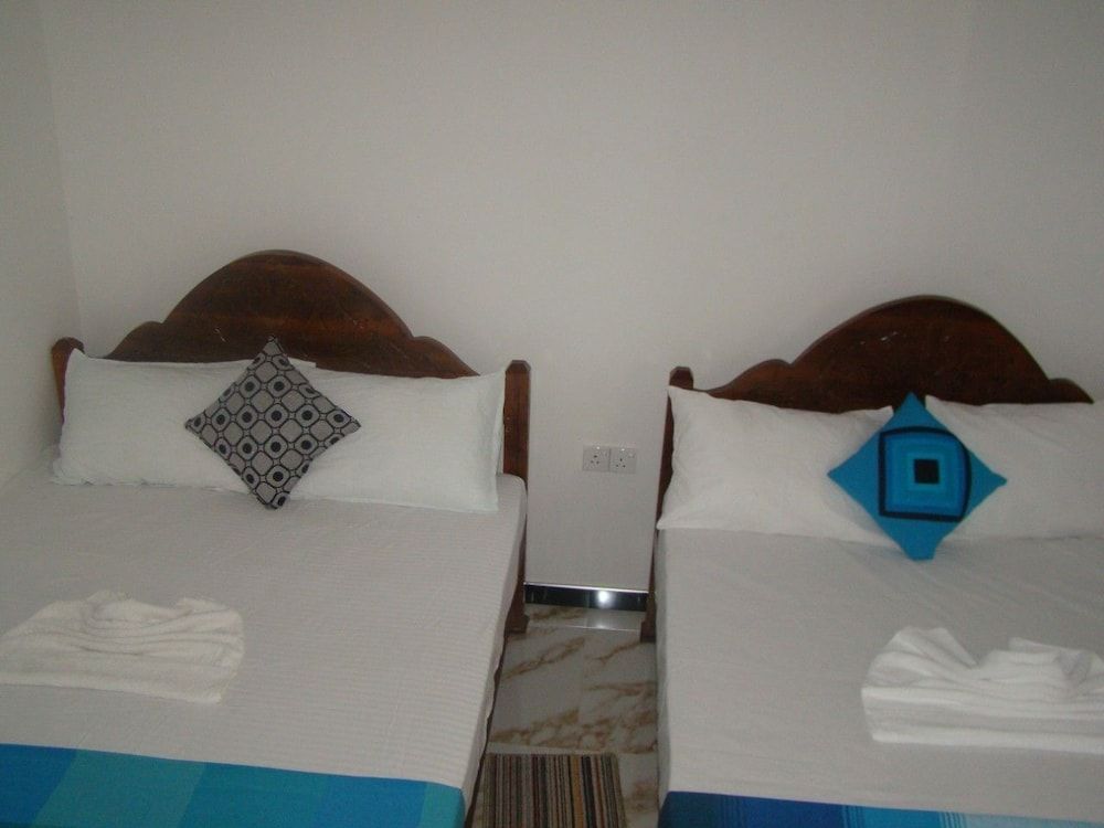 Nadun Rest Deluxe Twin Room, 3 Bedrooms, Garden View 4