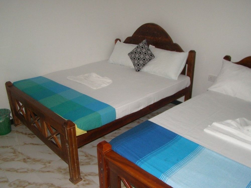 Nadun Rest Deluxe Triple Room, 1 Bedroom, Garden View 2