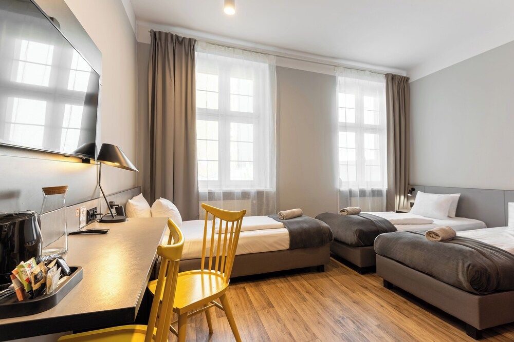 Standard Triple Room, 1 Bedroom, Private Bathroom, Courtyard View
