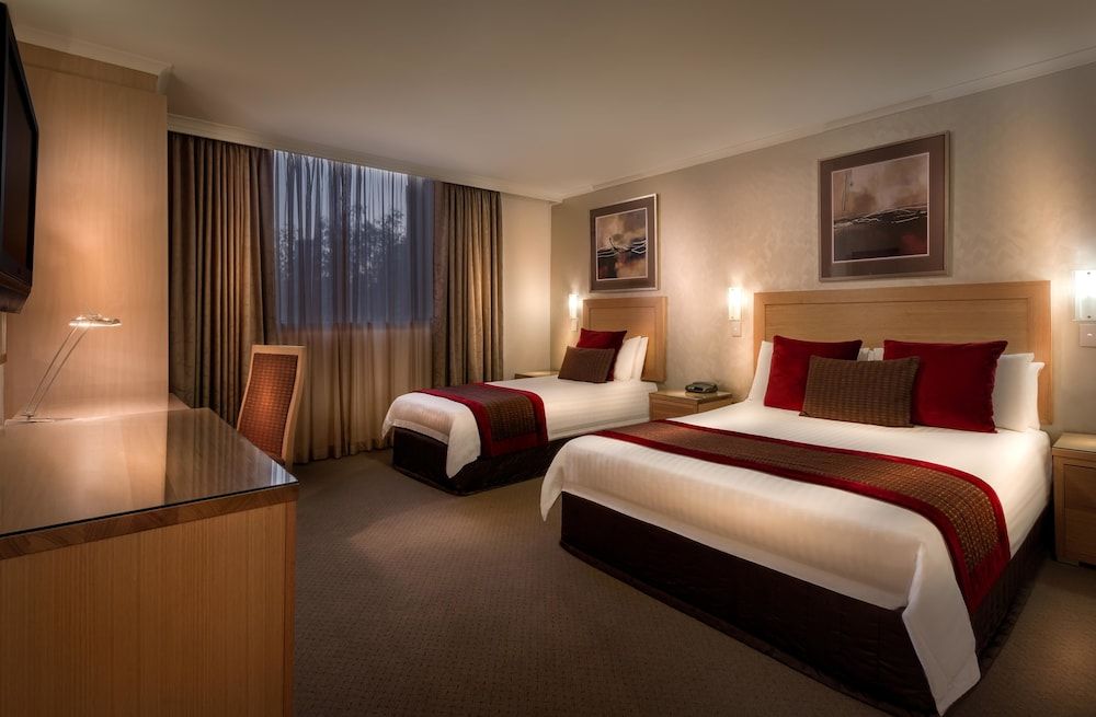 Best Western Plus Travel Inn Hotel Deluxe Room, Multiple Beds, Non Smoking (Walk-in Shower)