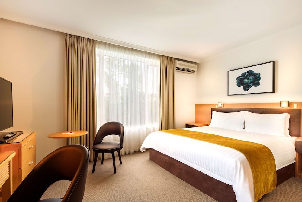 Best Western Plus Travel Inn Hotel Deluxe Room, 1 King Bed, Non Smoking (Walk-in Shower)