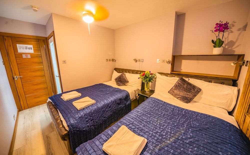 New Dawn Hotel Quadruple Room 2