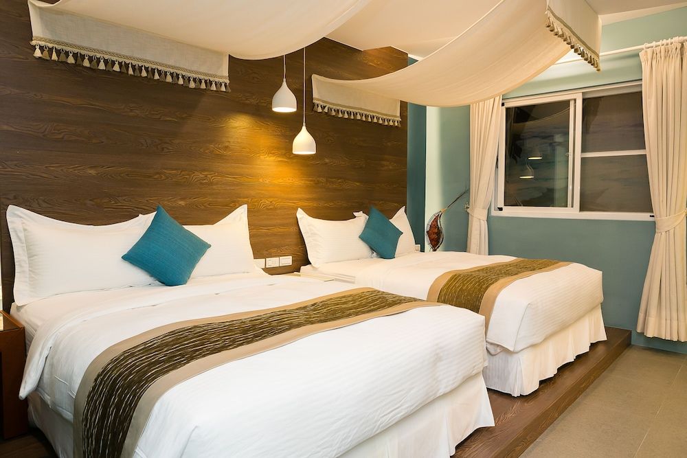 Bai Sha Tan Cottage Deluxe Quadruple Room 3