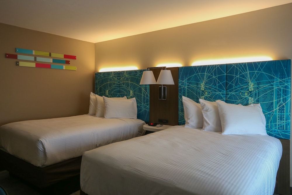 Oasis Inn Room, 2 Double Beds, Refrigerator & Microwave 5