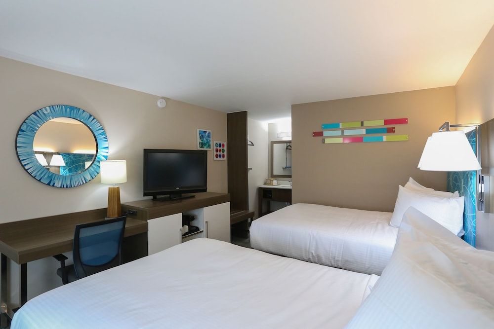 Oasis Inn Room, 2 Double Beds, Refrigerator & Microwave 4