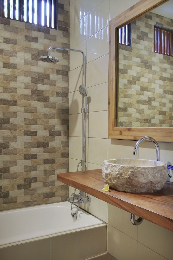 Sarin Ubud Suites by Pramana Villas Deluxe Room 7