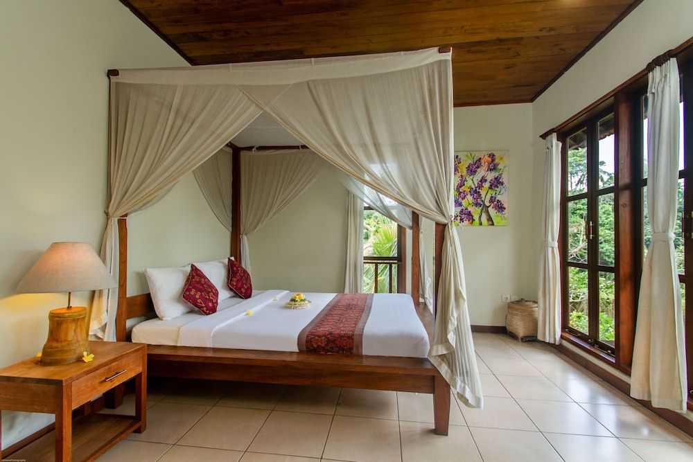 Sarin Ubud Suites by Pramana Villas Deluxe Room 4