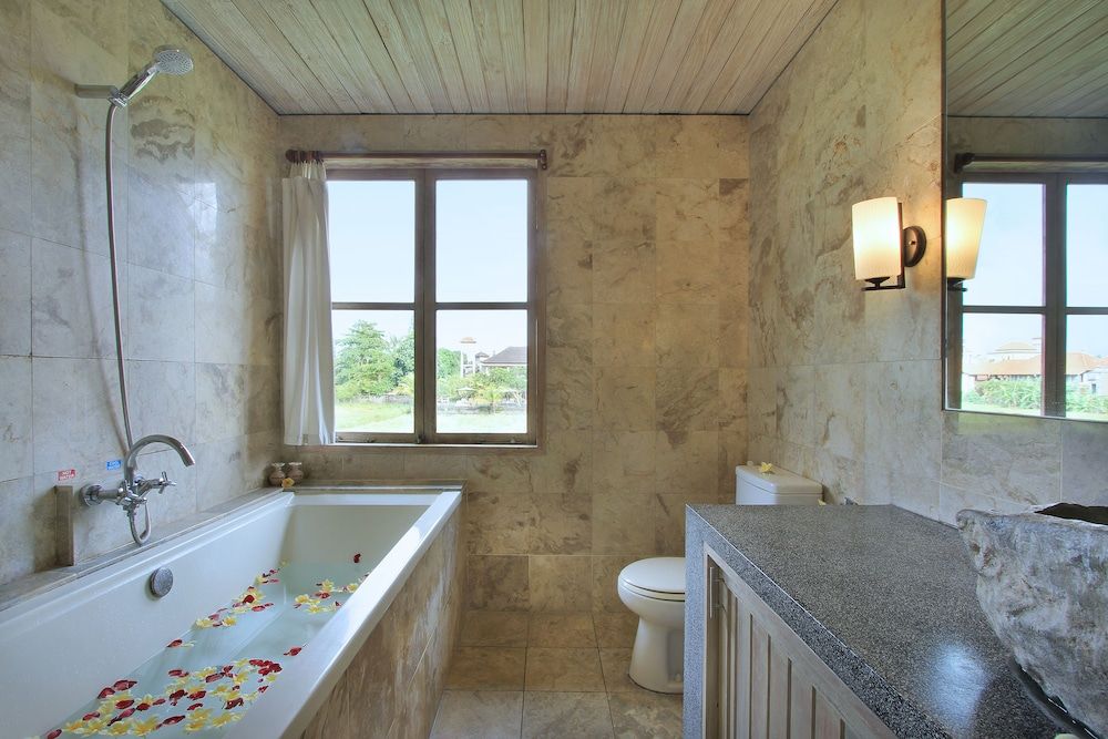 Sarin Ubud Suites by Pramana Villas Deluxe Room 8