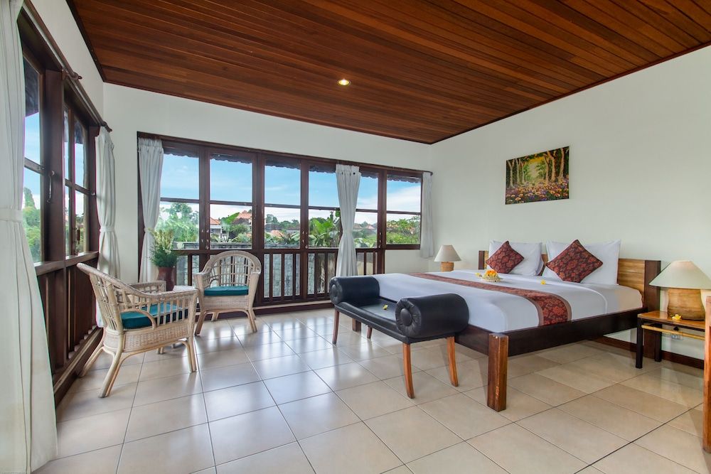 Sarin Ubud Suites by Pramana Villas Deluxe Room 6