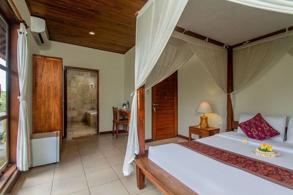 Sarin Ubud Suites by Pramana Villas Deluxe Room 3