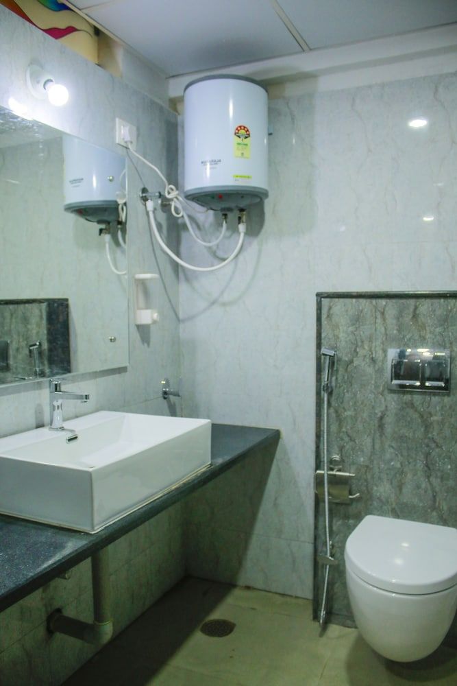 SKD Comforts Standard Room Non AC 7