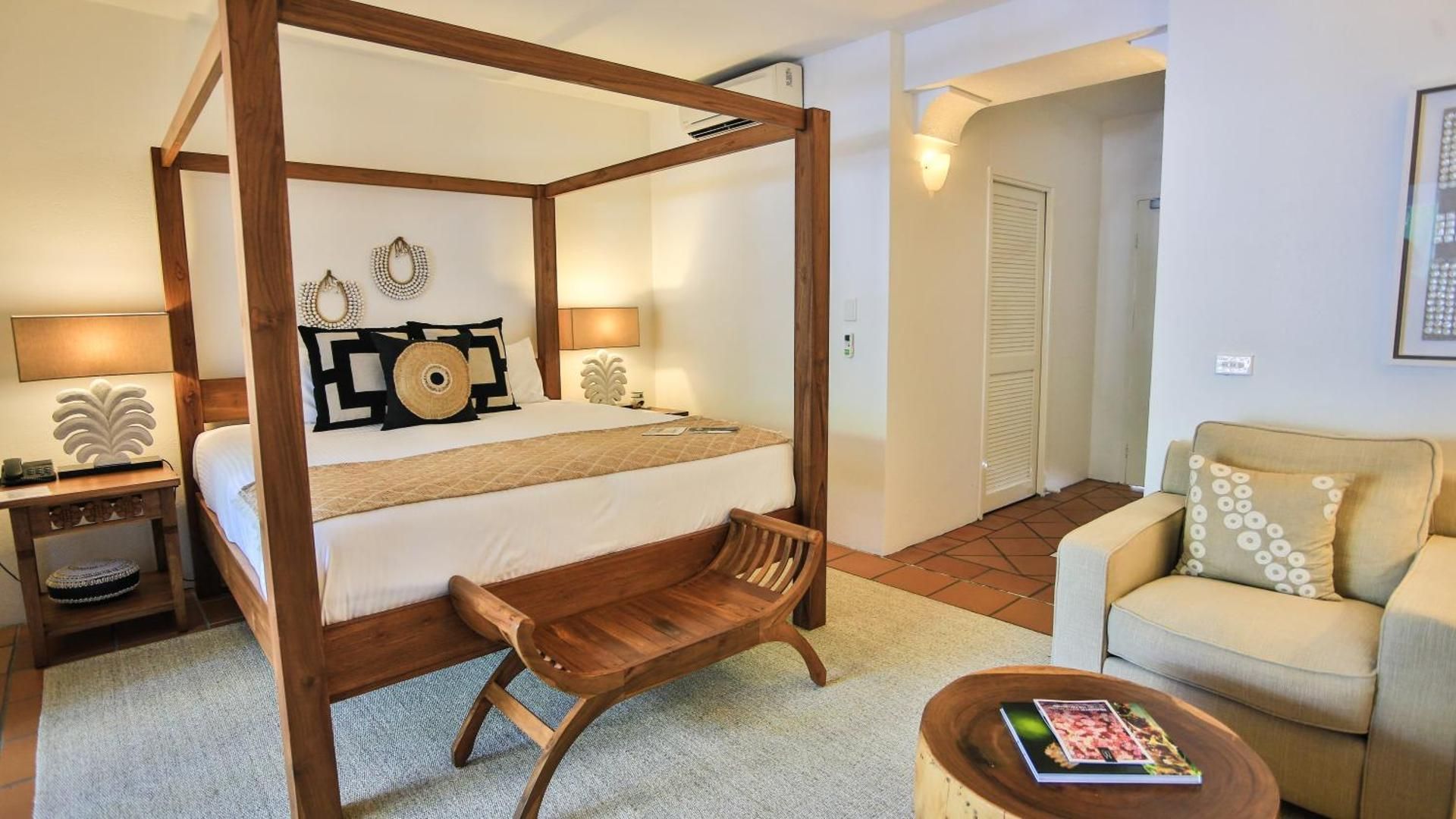 Verandah King Room Packages: Spacious outdoor living with uninterrupted pool and garden views