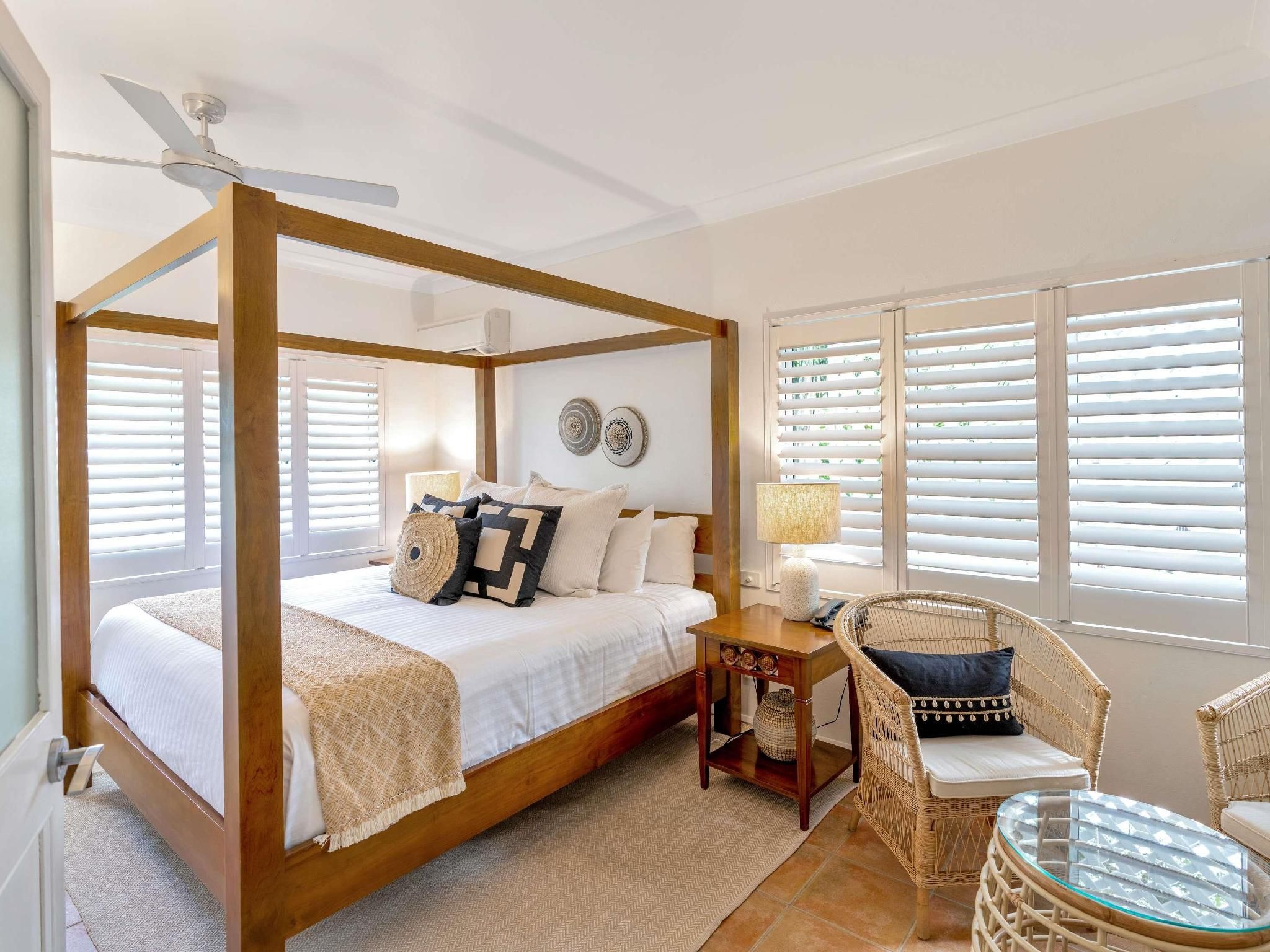 2 Bedroom One Bathroom Spa Apartment Packages: Tropical garden patio, spacious living and spa