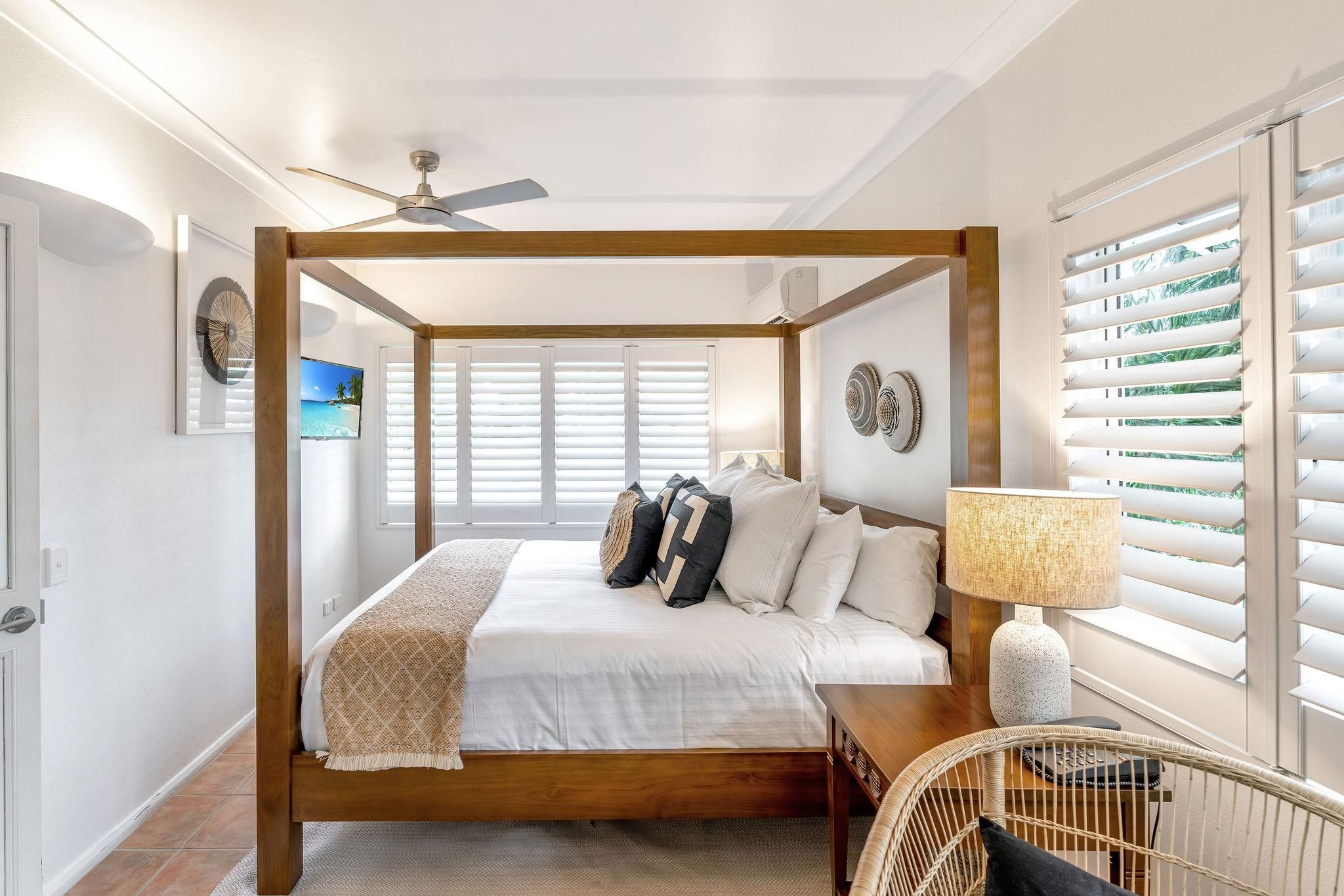 2 Bedroom One Bathroom Spa Apartment Packages: Tropical garden patio, spacious living and spa
