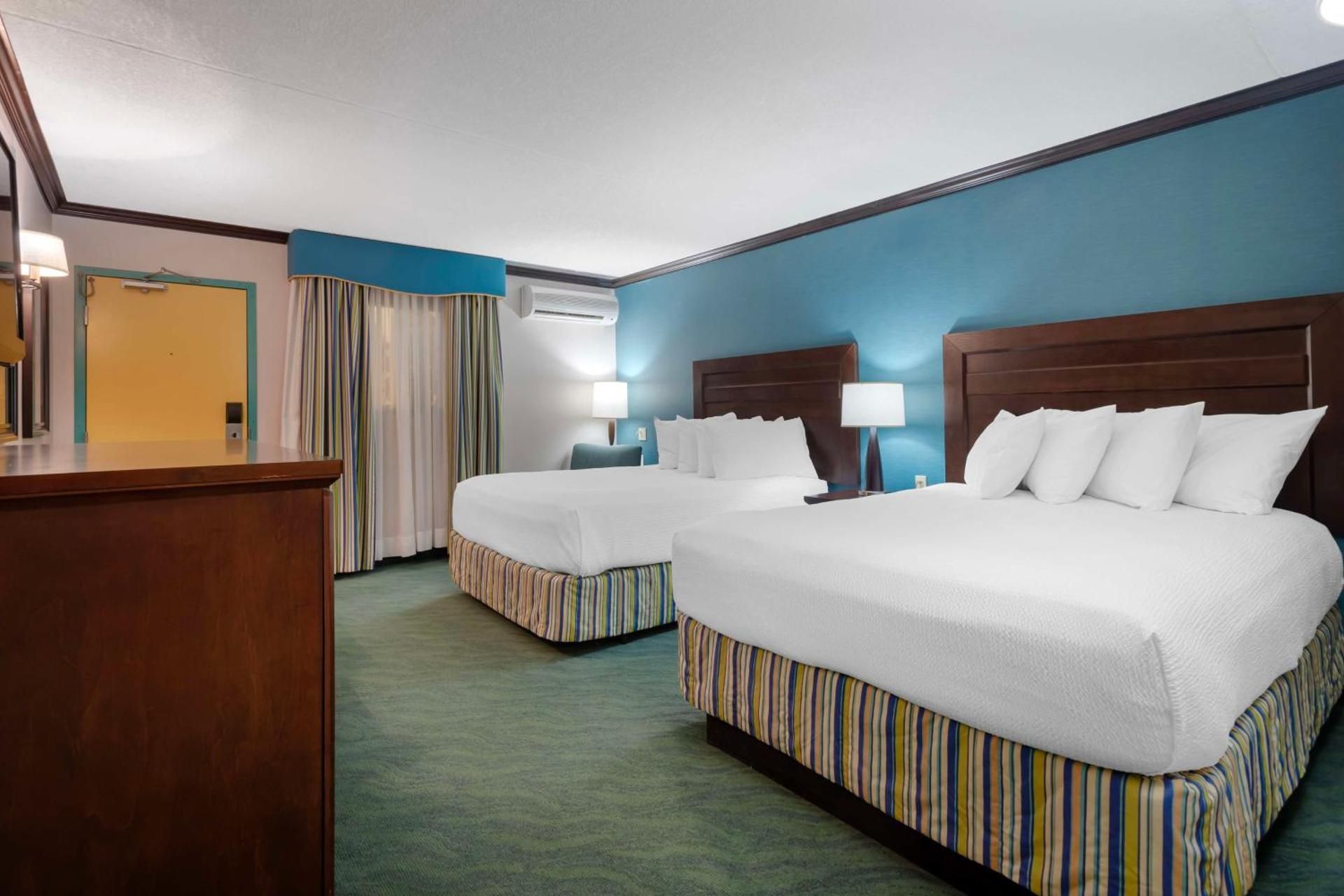 2 Queen Beds, Non-Smoking, High Speed Internet Access, First Floor, Poolside, Microwave And Refriger