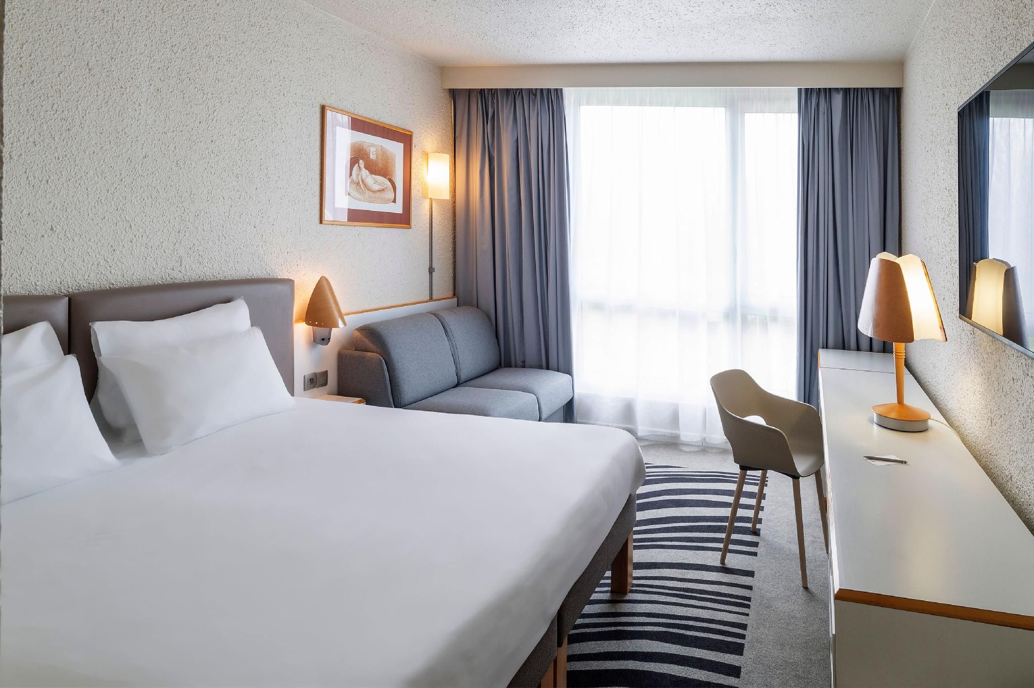 Classic Room with 1 double bed and 1 single sof a bed